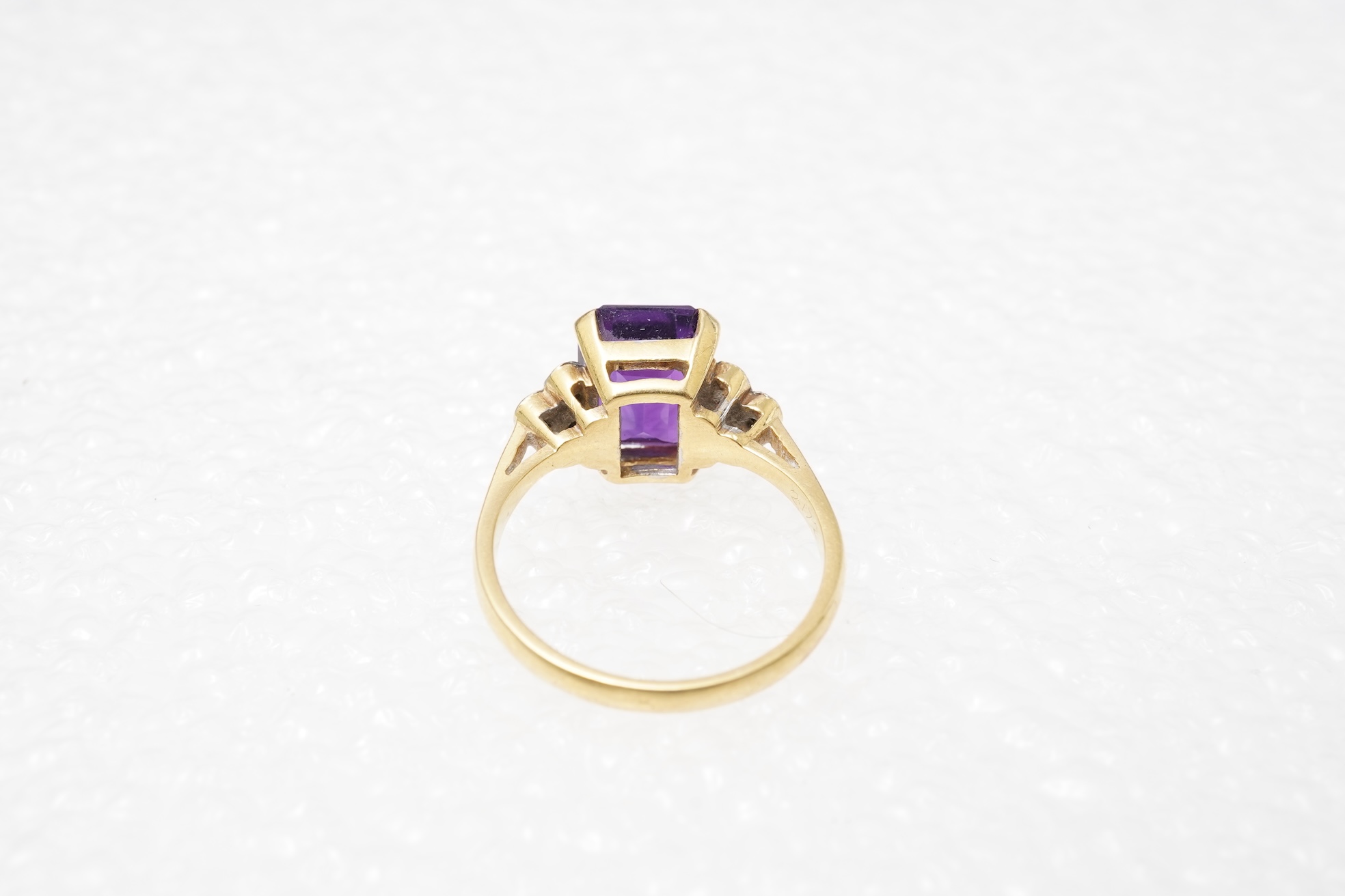 An amethyst and diamond ring